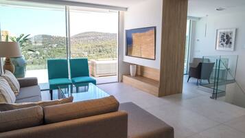 Suite Grand, Beberapa Tempat Tidur, pemandangan laut | Area keluarga | TV layar datar