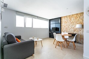 Suíte básica | Área de estar | TV de tela plana