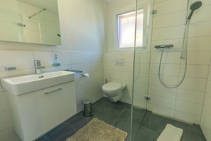 Hair dryer, towels, soap, toilet paper