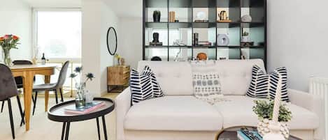 Apartment (1 Bedroom) | Living area | 37-inch Smart TV with cable channels, TV