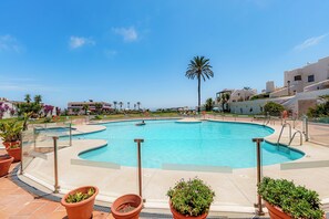 Outdoor pool - "Beachfront Apartment: Serenity by the Sea - Ideal for Families" (Playa del Sol Villacana)