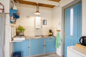Fridge, microwave, coffee/tea maker, dining tables
