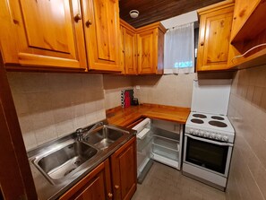 Fridge, oven, electric kettle, cookware/dishes/utensils