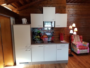 Fridge, microwave, electric kettle, cookware/dishes/utensils
