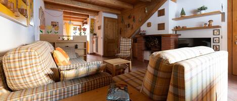 Apartment (2 Bedrooms) | Living area | 55-inch Smart TV with satellite channels