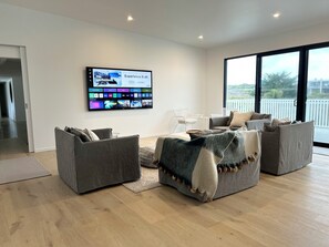 Smart TV, fireplace, table tennis, books