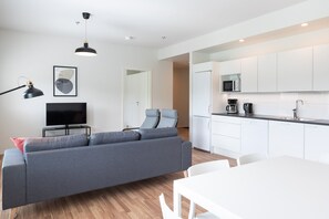 Standard Apartment | Living area | 32-inch TV with cable channels - Forenom Serviced Apts Turku Pansio (Turku)
