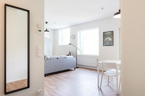 Standard Apartment | Living area | 32-inch TV with cable channels - Forenom Serviced Apts Turku Pansio (Turku)