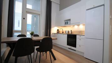 Apartamento standard | Área de estar | TV 32 polegadas com canais a cabo