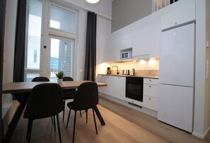 Standard Apartment | Living area | 32-inch TV with cable channels - Forenom Apts Turku Kirstinpuisto (Turku)