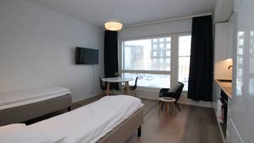 Standaard studio | 1 slaapkamer, verduisterende gordijnen, een strijkplank/strijkijzer