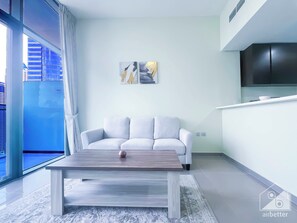 Living room - Stunning 1B With Balcony in the Heart of Dubai (Dubai)