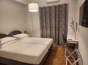 3 habitaciones, tabla de planchar con plancha, wifi y ropa de cama 