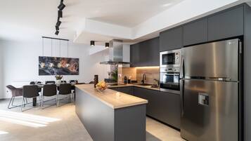 Exclusive Villa | Private kitchen | Full-sized fridge, microwave, oven, dishwasher