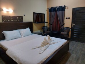 Kamar Double atau Twin Deluks, pemandangan kebun | Kedap suara, setrika/meja setrika, dan Wi-Fi gratis