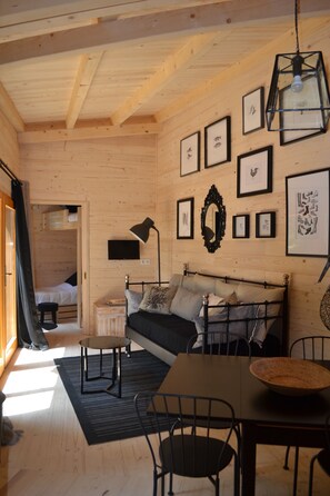 Casa de campo, vista para o jardim | Área de estar