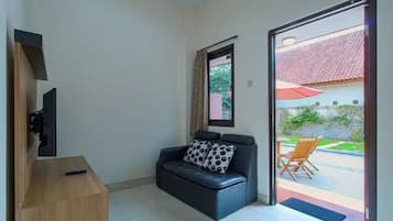 Family Triple Room | Living area