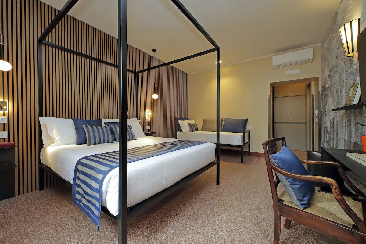 Deluxe Triple Room, City View