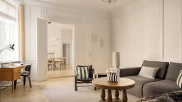 Exclusive Apartment | Living area | 45-inch flat-screen TV with digital channels