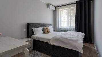 2 chambres, fer et planche à repasser, Wi-Fi, draps fournis