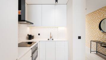 Fridge, oven, coffee/tea maker, toaster