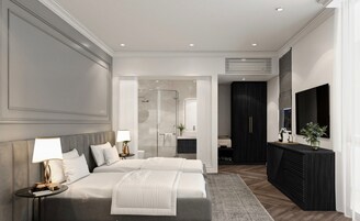 Un dormitorio moderno con una cama grande, mesitas de noche, un vestidor y un baño con ducha.