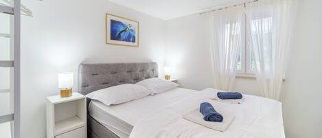 2 dormitorios, tabla de planchar con plancha, wifi gratis y ropa de cama