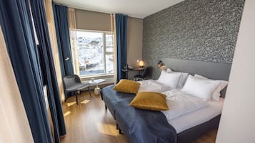 Down comforters, pillowtop beds, desk, laptop workspace