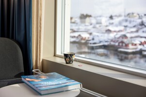 Down comforters, pillowtop beds, desk, laptop workspace