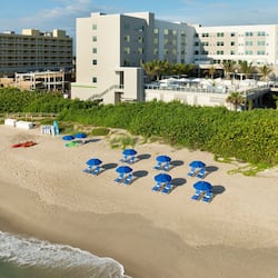 Enjoy stunning ocean views from this beachfront hotel's spacious balconies.