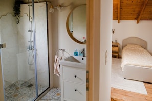 Shower, hair dryer, towels, soap