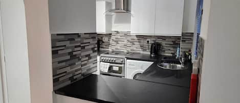 Apartment | Private kitchen | Fridge, microwave, oven, stovetop