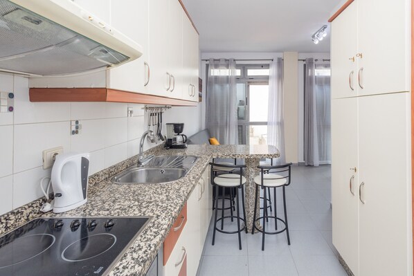 Fridge, microwave, coffee/tea maker, electric kettle