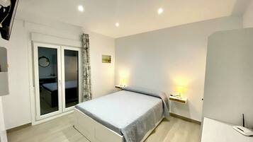 2 slaapkamers, een strijkplank/strijkijzer, gratis wifi, beddengoed