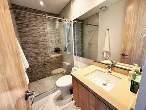 Hair dryer, towels, soap, shampoo
