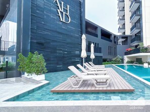 Outdoor pool, open 9:00 AM to 6:00 PM, pool umbrellas, sun loungers
