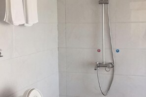 A shower with a handheld hose, a wall-mounted control, and a towel rack. - Yuxian Tea Farmer Inn (Taohuatan Scenic Area) (Jing County)