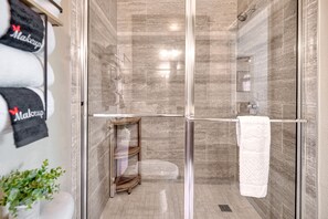 Shower, hair dryer, towels, soap