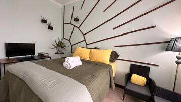 1 habitación, tabla de planchar con plancha, wifi y ropa de cama