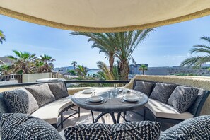 Outdoor dining - 2BR Condo near Cabo Bello (Colonia del Sol)