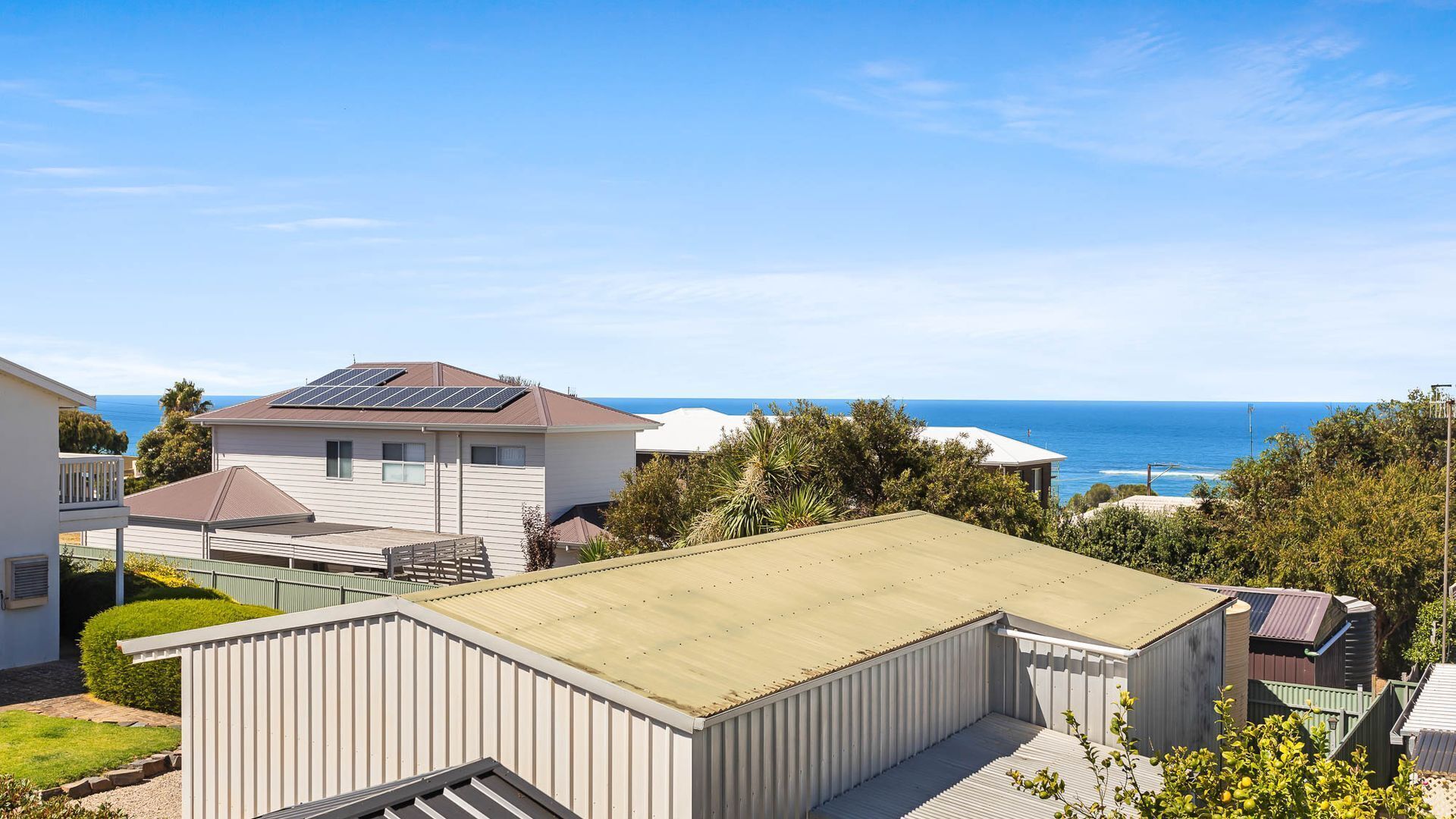 A residential area with a view of the ocean.