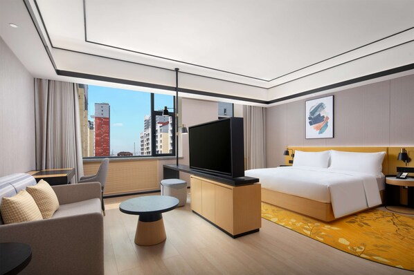 Habitación Deluxe, 1 cama King size | Área de sala de estar
