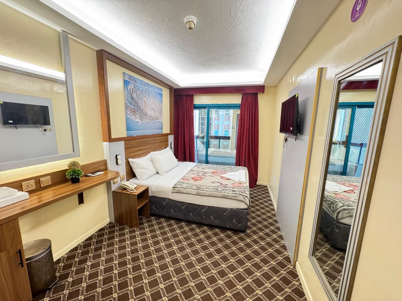 Standard Double Room, City View | Laptop workspace, free WiFi, bed sheets