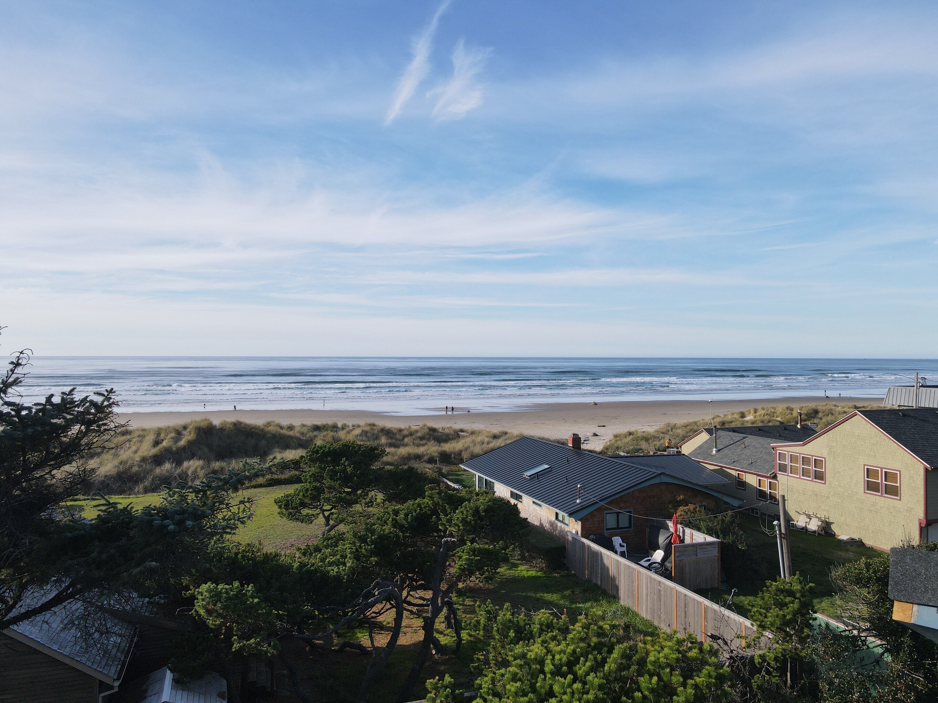 Ocean-view, dog-friendly home with private hot tub & deck - walk to the beach