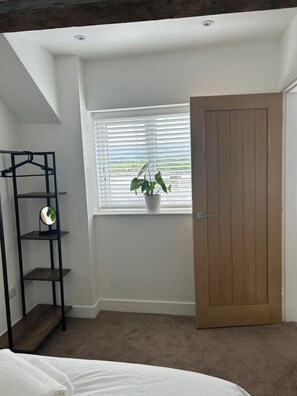 2 dormitorios, tabla de planchar con plancha, wifi gratis y ropa de cama