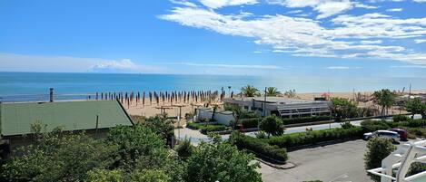 Private beach, sun loungers, beach umbrellas, beach bar