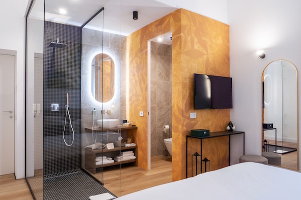 Grand Suite | Bathroom | Eco-friendly toiletries, hair dryer, slippers, bidet