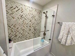 Shower, eco-friendly toiletries, hair dryer, bidet