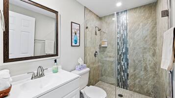 Shower, towels, toilet paper