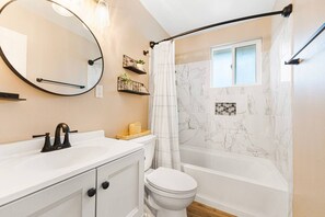 Hair dryer, towels, soap, shampoo